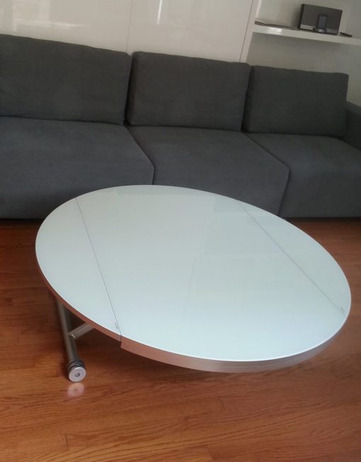 smart-glass-lifting-round-coffee-table-in-its-large-size-lowered-to-low-profile-form