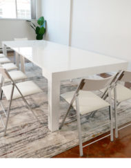 White-Tiny-Titan-Transformer-Table-extends-to-seat-14-with-2-chairs-on-the-ends