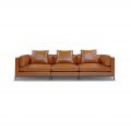 3 seat wide large leather sofa in brown orange in a mid century modern design
